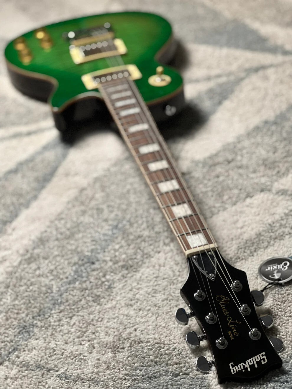 Soloking SLS50FM Deluxe with 5A Flame Top in Green Burst